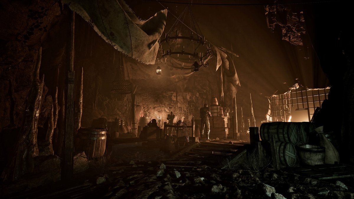 Gothic 1 Remake — тёмный лагерь в шахте с факелами, скриншот