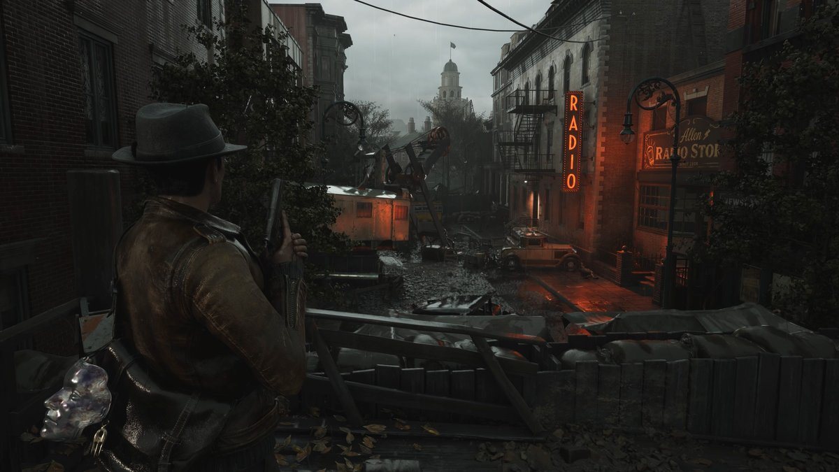 The Sinking City 2 — Кэлвин Рафферти на затопленной улице Аркхэма, скриншот на PS5