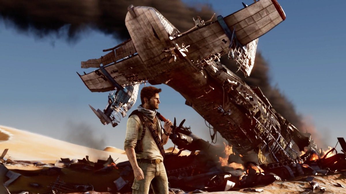 Uncharted 3 — Натан Дрейк у обломков самолёта в пустыне, скриншот